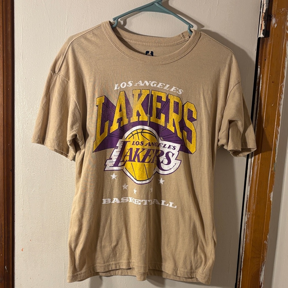 *3 for $25* NBA Logo Tee in Tan with Navy Print